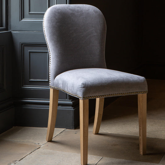 Carlton Furniture Pair of Pavilion Dining Chairs - Smoke with Grey oil legs & Brass Studs — lifestyle setting