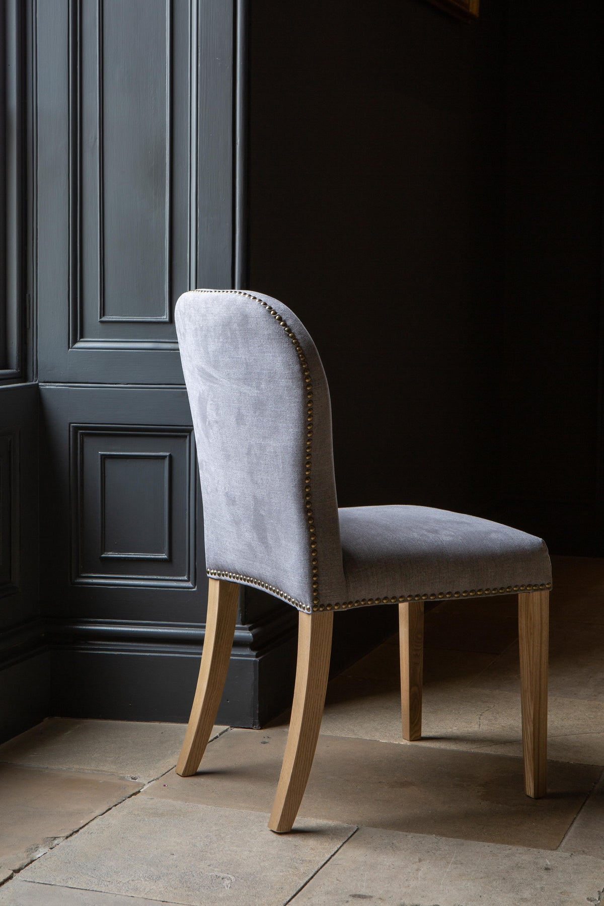 Carlton Furniture Pair of Pavilion Dining Chairs - Smoke with Grey oil legs & Brass Studs — lifestyle setting