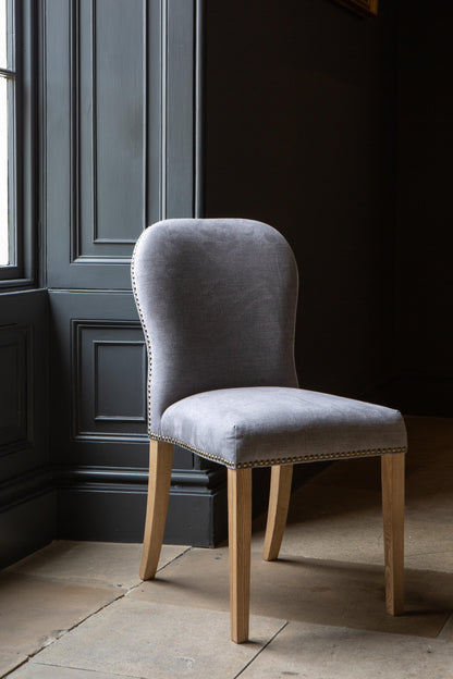 Carlton Furniture Pair of Pavilion Dining Chairs - Smoke with Grey oil legs & Brass Studs — lifestyle setting