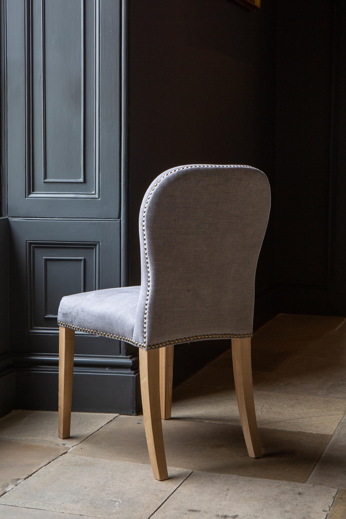 Carlton Furniture Pair of Pavilion Dining Chairs - Smoke with Grey oil legs & Brass Studs — lifestyle setting