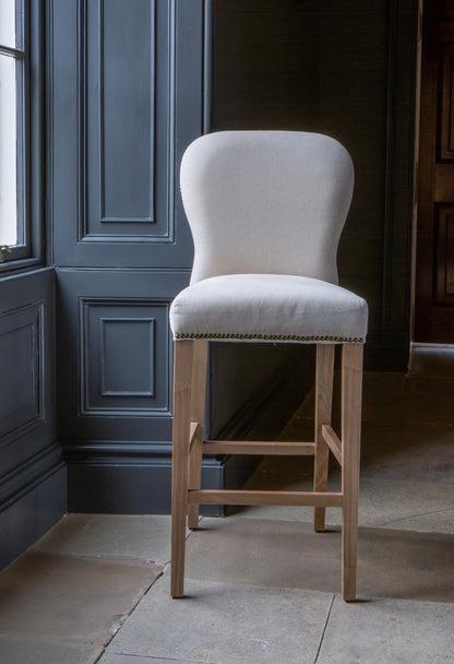 Carlton Furniture Pavilion Barstool - Natural Linen Grey oil legs & Brass Studs — lifestyle setting