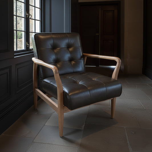 Carlton Furniture Ribble Armchair in Green Leather with Fabric Back - room view of dark green leather Ribble chair with wooden arms