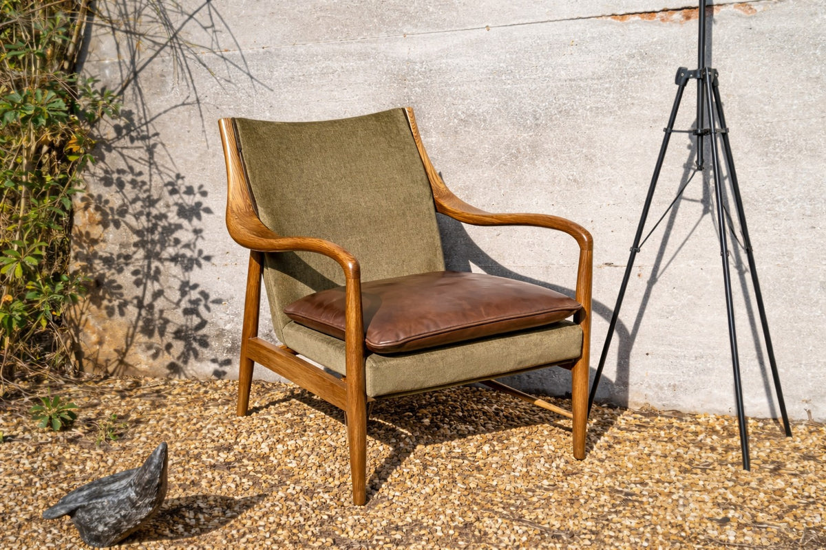 Carlton Furniture Tisbury Armchair in Verona Seaweed - outdoor photography view of curved wooden armchair