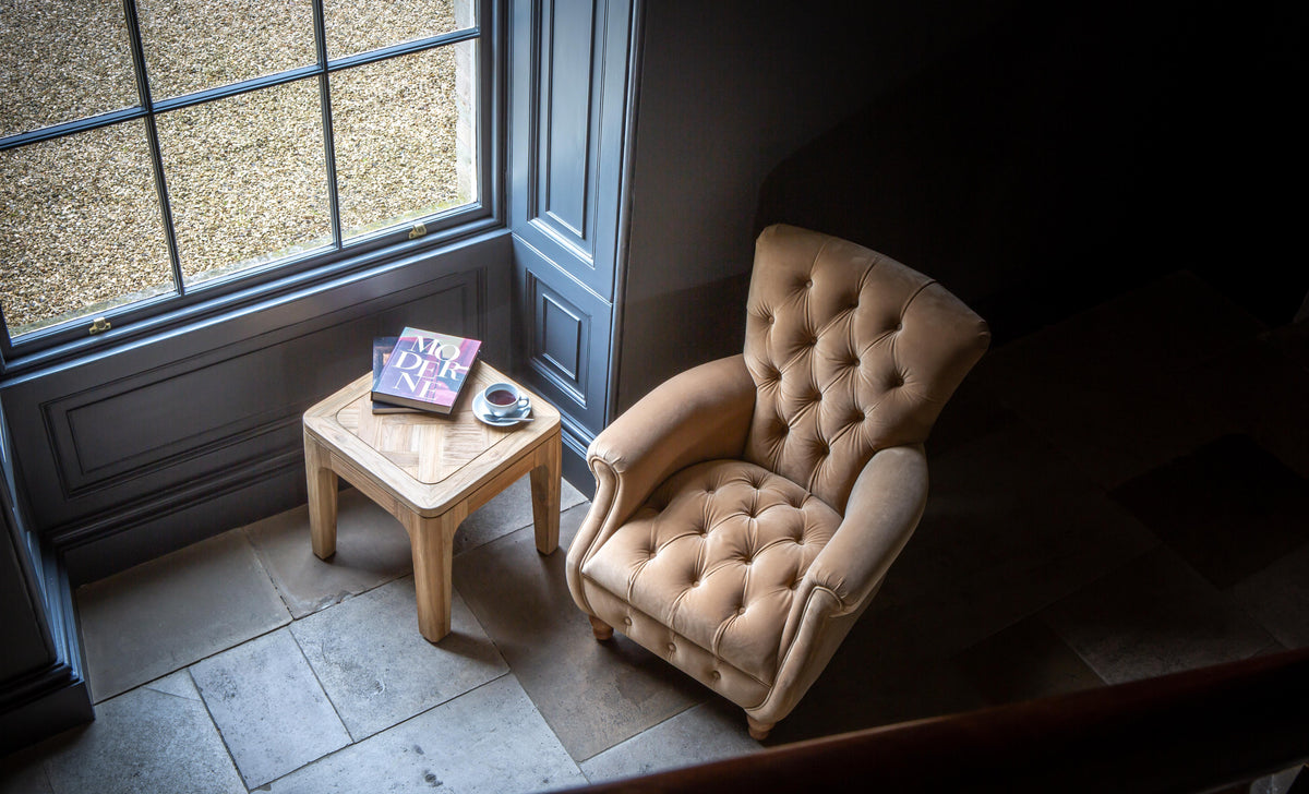 Carlton Furniture Westminster Armchair in Butterscotch Velvet - overhead room view of buttoned seat and rolled arms