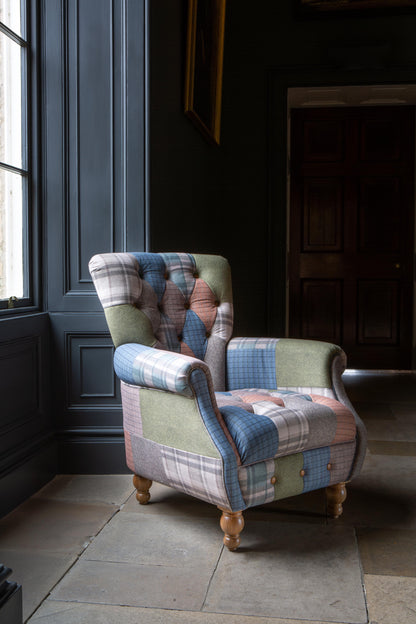 Carlton Furniture Westminster Armchair in Patchwork with Natural Legs - angled room view of patchwork armchair and natural turned feet