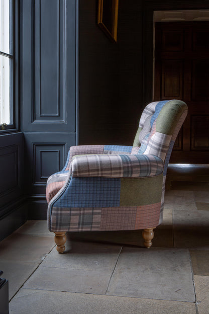 Carlton Furniture Westminster Armchair in Patchwork with Natural Legs - side room view of patchwork chair and rolled arm