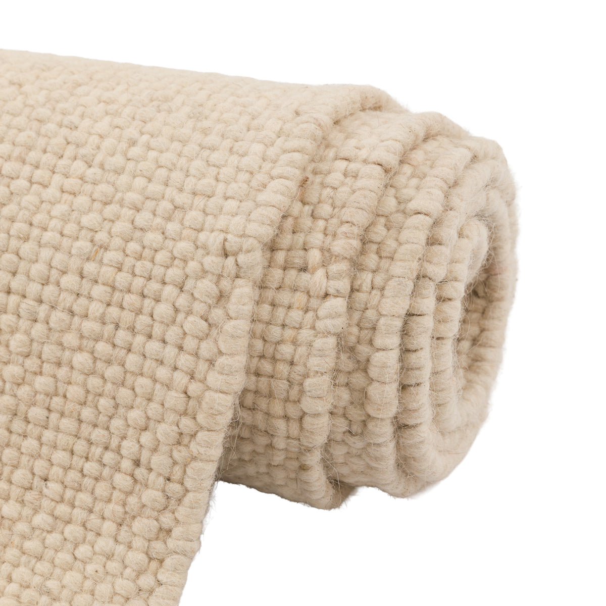 Gallery Direct Amara Rug Cream - rolled rug showing weave and pile texture