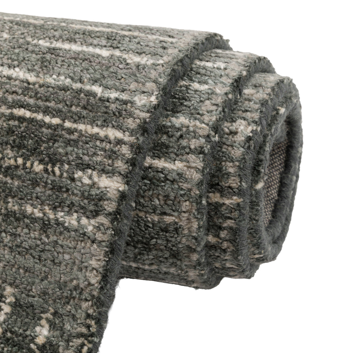 Gallery Direct Azelo Geo Rug Graphite - rolled rug showing weave and pile texture