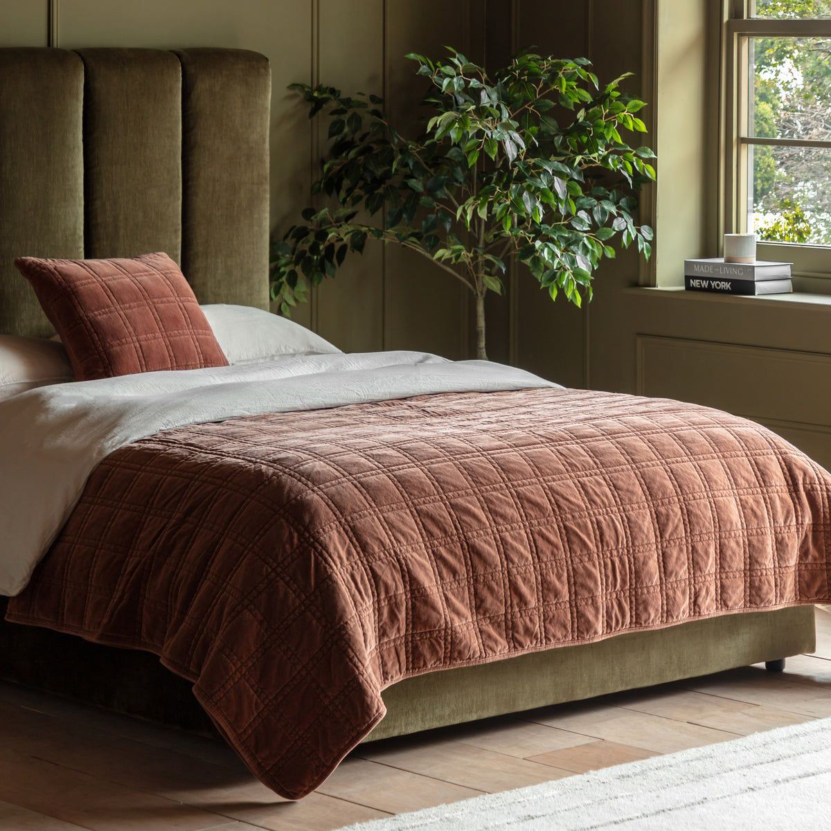 Gallery Direct Cotton Velvet Quilted Bedspread Rust 2200x2400mm - styled across a bed in a bedroom