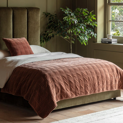 Gallery Direct Cotton Velvet Quilted Bedspread Rust 2200x2400mm - styled across a bed in a bedroom