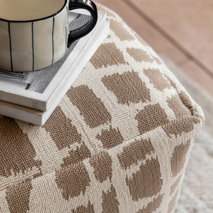 Gallery Direct Elara Jacquard Pouffe Mocha 550x550x350mm - jacquard upholstery close-up with a mug and books