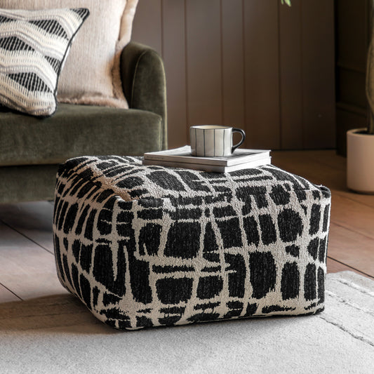 Gallery Direct Elara Jacquard Pouffe Slate 550x550x350mm - styled beside a sofa