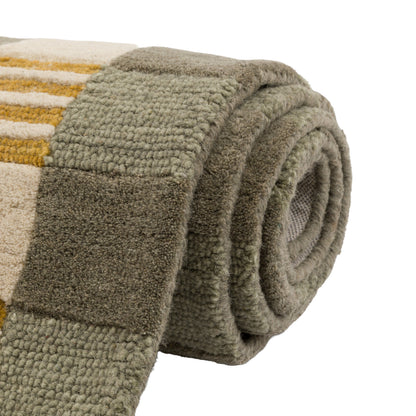 Gallery Direct Lezo Geo Rug Teal - rolled rug showing weave and pile texture