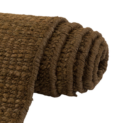 Gallery Direct Luma Rug Chocolate - rolled rug showing weave and pile texture