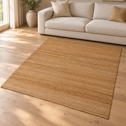 Gallery Direct Maris Rug Natural styled in a neutral living room; complete rug visible
