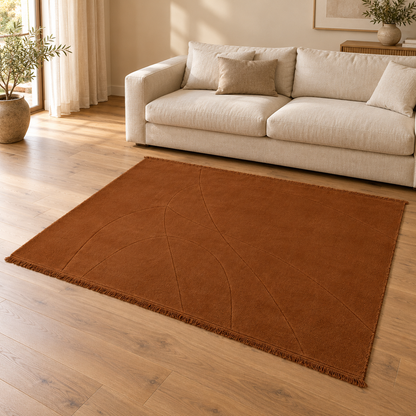 Gallery Direct Sienna Rug Terracotta styled in a neutral living room; complete rug visible