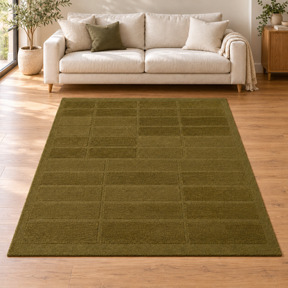 Gallery Direct Virelle Rug Olive styled in a neutral living room; complete rug visible