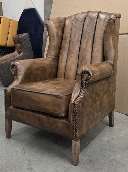 Vintage Sofa Company Clive Fluted Wing Chair in Distressed Antique Leather — lifestyle setting