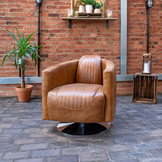 Vintage Sofa Company Spitfire Rocket Swivel Armchair shown in a room setting