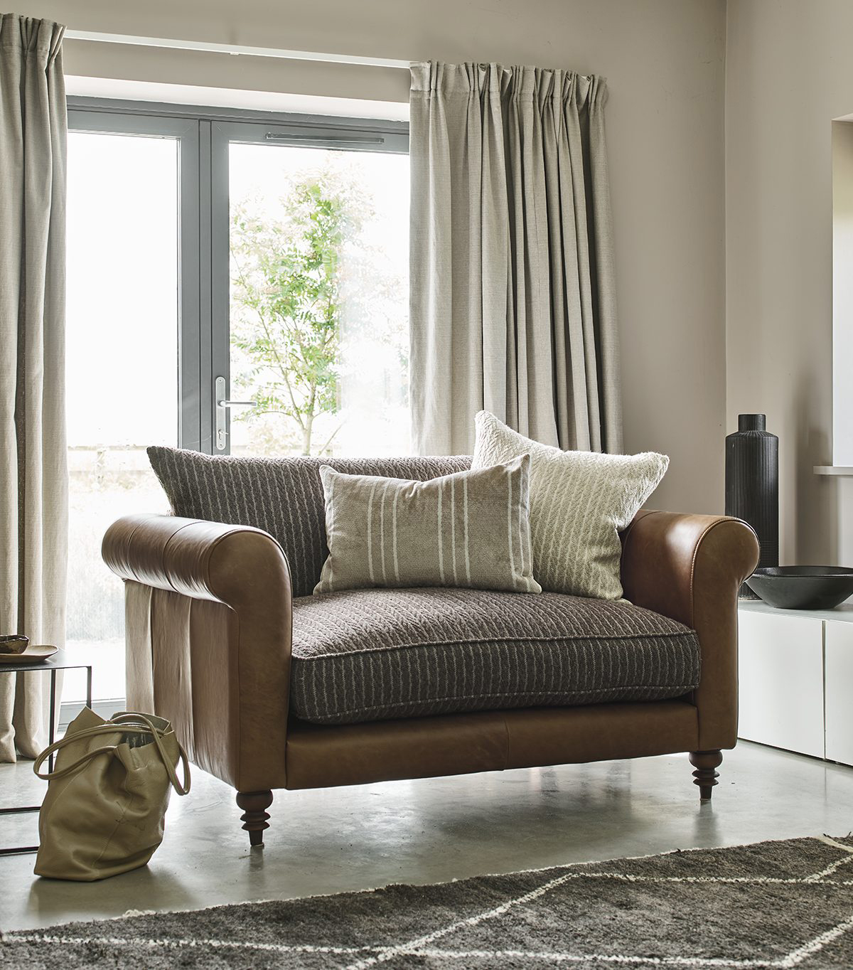 Alexander & James Ralphie Snuggler Sofa Shown in Eco Legume Leather and Knit Mink Fabric