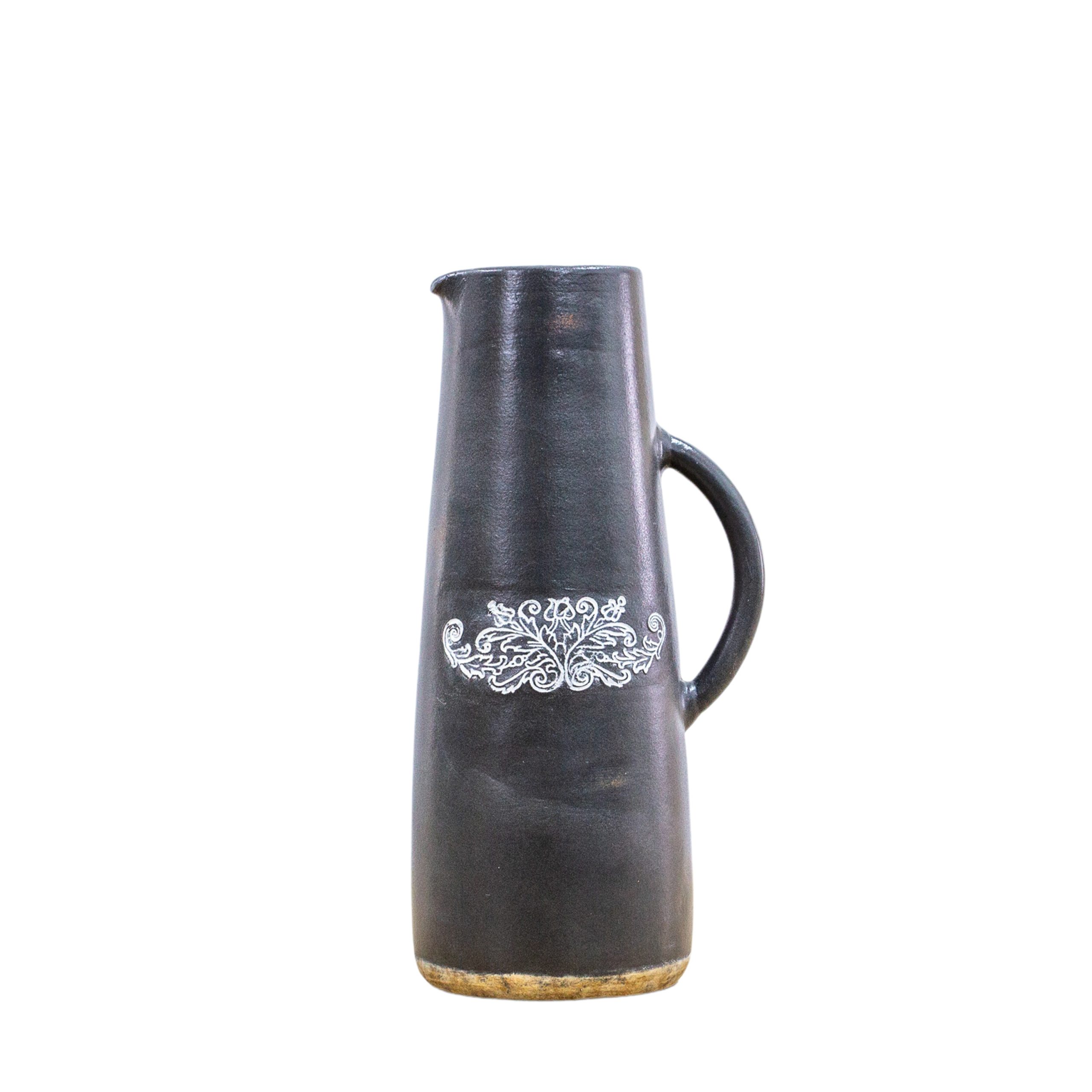 black jug with plant design | Shackletons