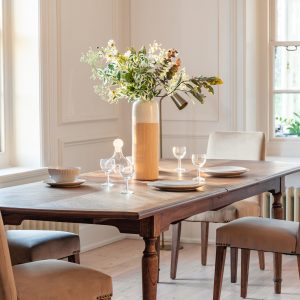 beige and white vase on dining table | Shackletons