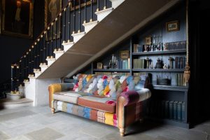 Dickinson 2 Seat Large Sofa In Patchwork  Tan Leather With Mid Oak Legs | Shackletons